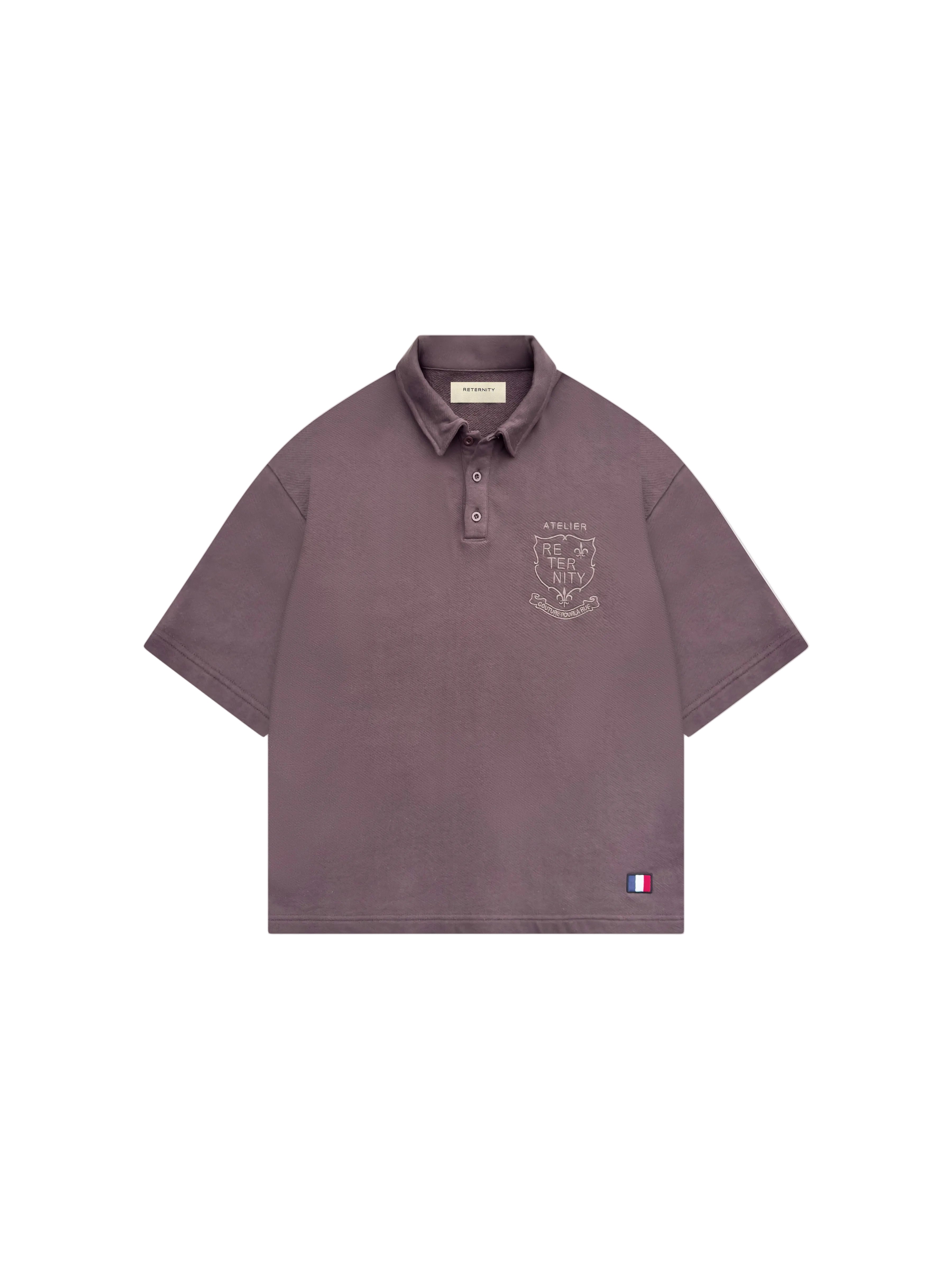 Polo Reternity L'Atelier de la Rue marrón Corte boxy y Cropped, Bordado detalle en el pecho y parche en la espalda.