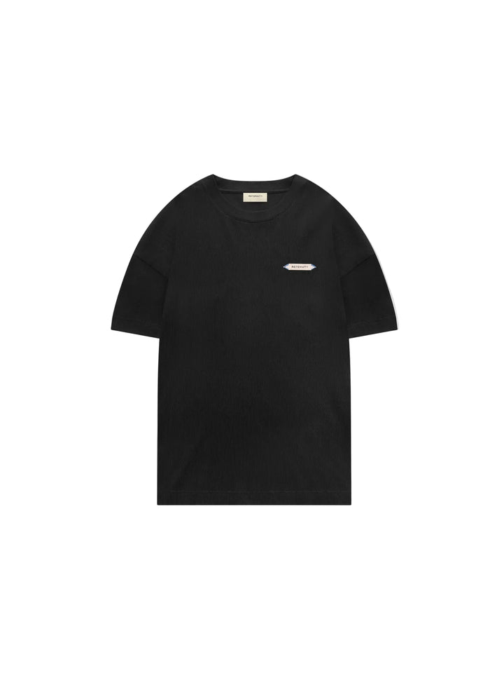 Camiseta Reternity L'Atelier Line Rib negra con pequeña etiqueta Reternity en el pecho, tejido acanalado, vista frontal