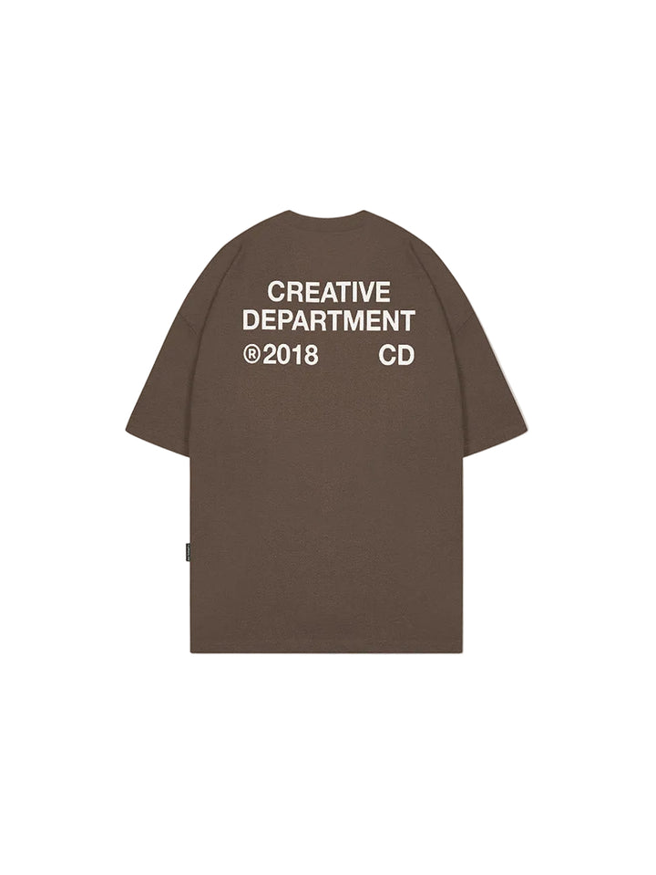 Camiseta boxy fit RETERNITY CREATIVE DEPARTMENT color marrón, algodón y estampado CD blanco