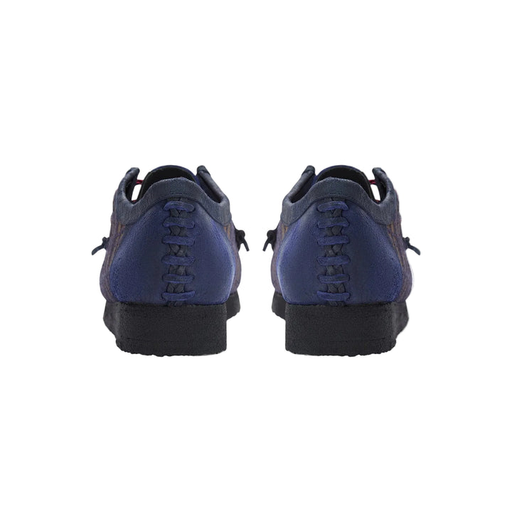 Wallabee Nicholas Daley vista trasera con costuras whipstitch en talón