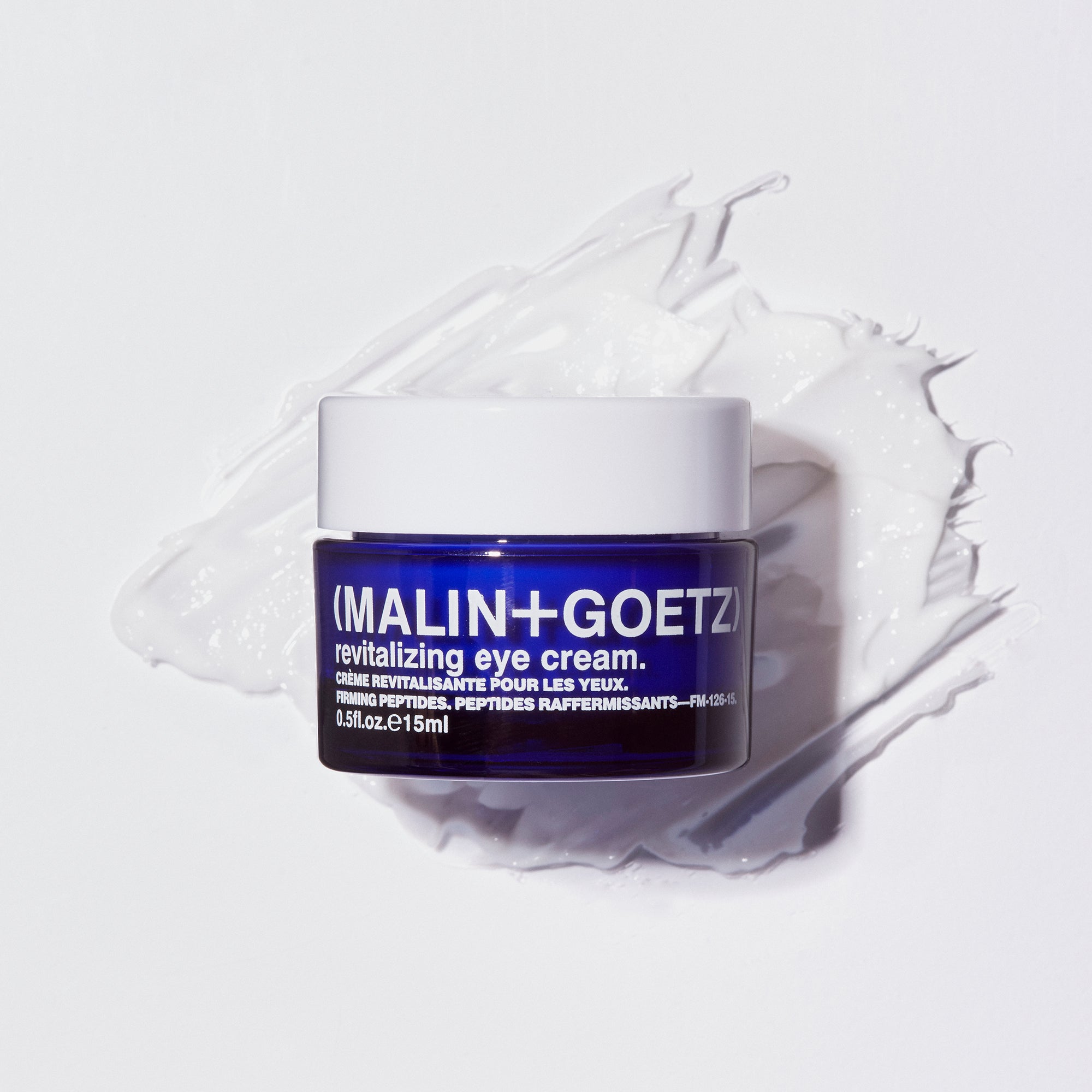 MALIN+GOETZ Revitalizing Eye Cream detalle textura crema contorno ojos skincare premium