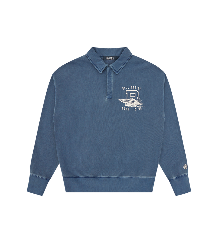 sudadera Boat Club Washed Quarter Snap Navy de Billionaire Boys Club Spring 26'' acabado whased vintage único. Destaca el cuello con botones, el detalle Boat en el pecho y el icónico Arch Logo blanco en la parte trasera.