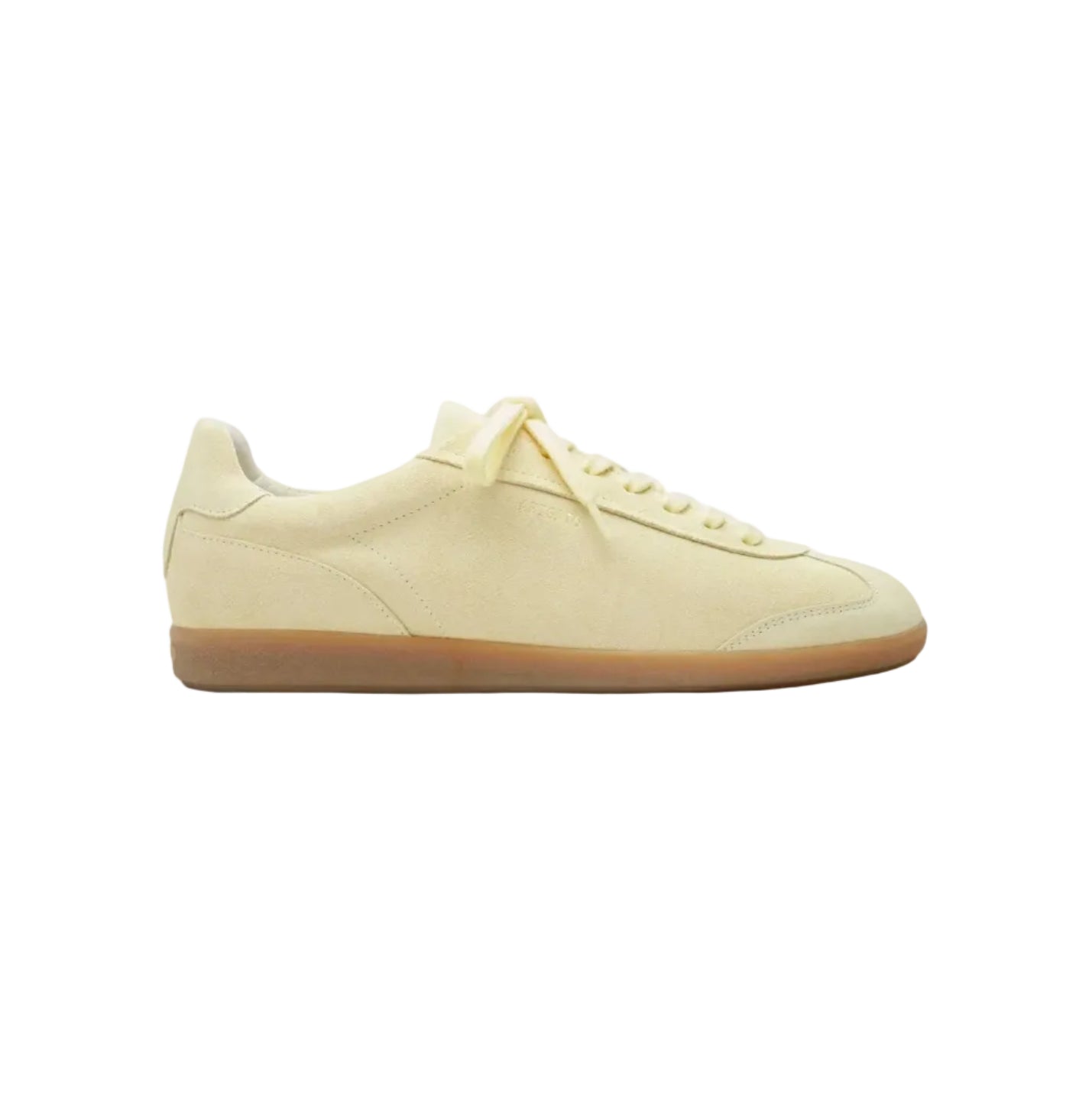 Zapatilla Axel Arigato Zane en ante amarillo claro vista de perfil, con suela gum