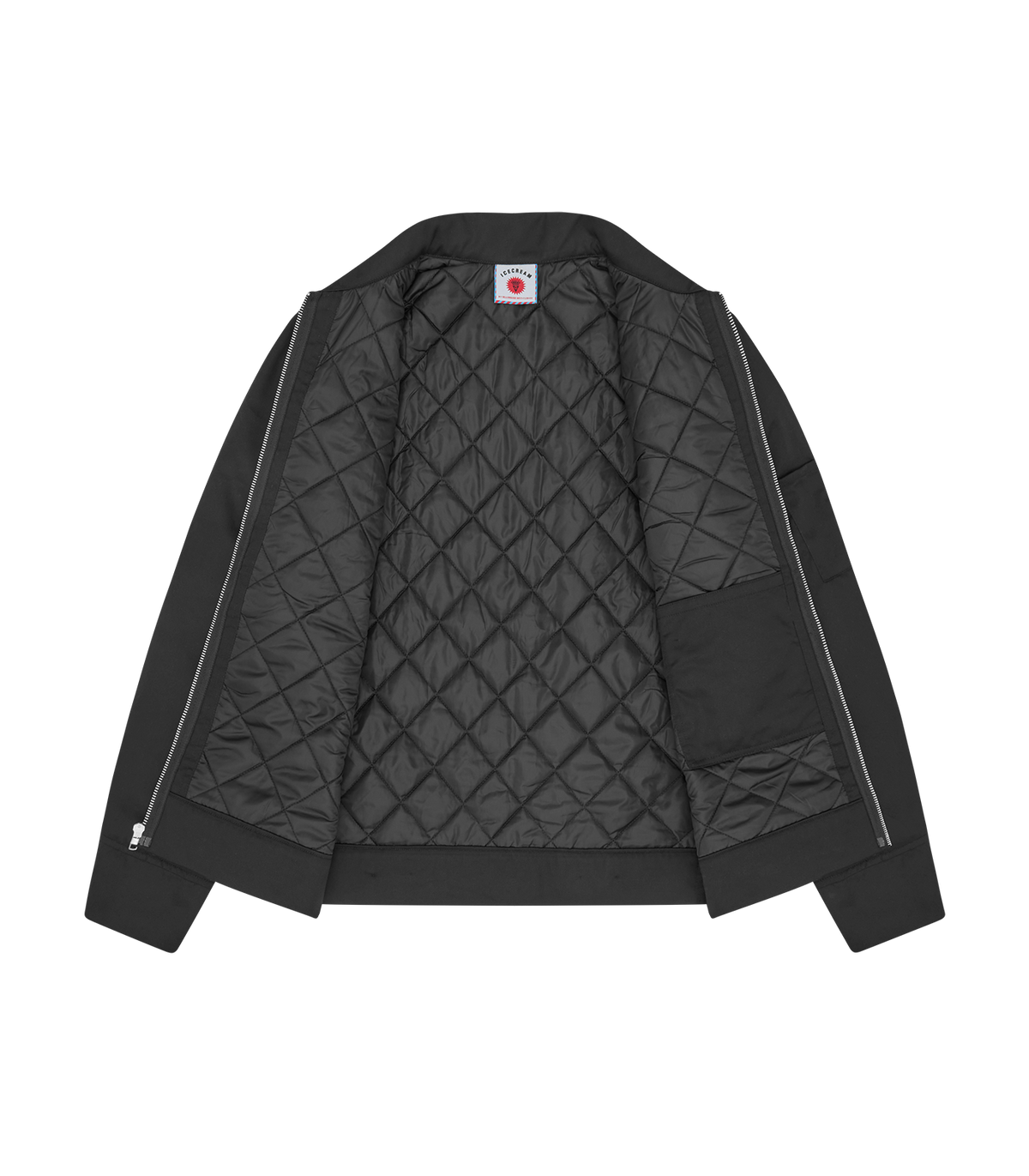 Interior de la chaqueta ICECREAM Drippy Quilted negra mostrando el forro acolchado