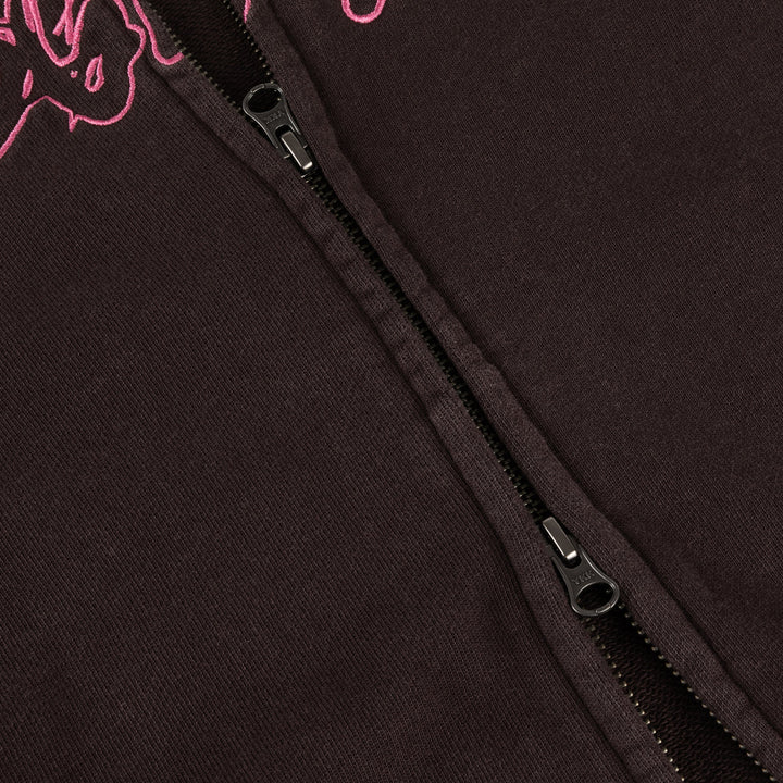 Detalle de la doble cremallera central de la sudadera Dime marrón lavada